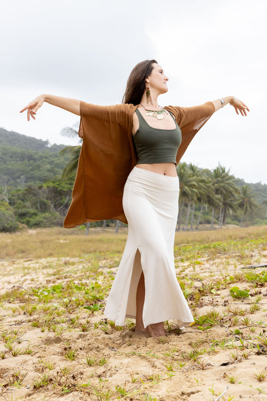 Close-up of Adore Kaftan Cotton Gold fabric texture – breathable organic cotton"