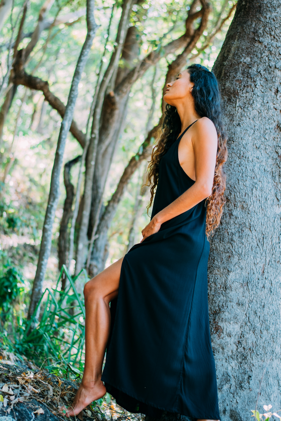 This boho maxi dress features a blend of linen and rayon for a comfortable and stylish fit. It is ethically handcrafted in Bali,
