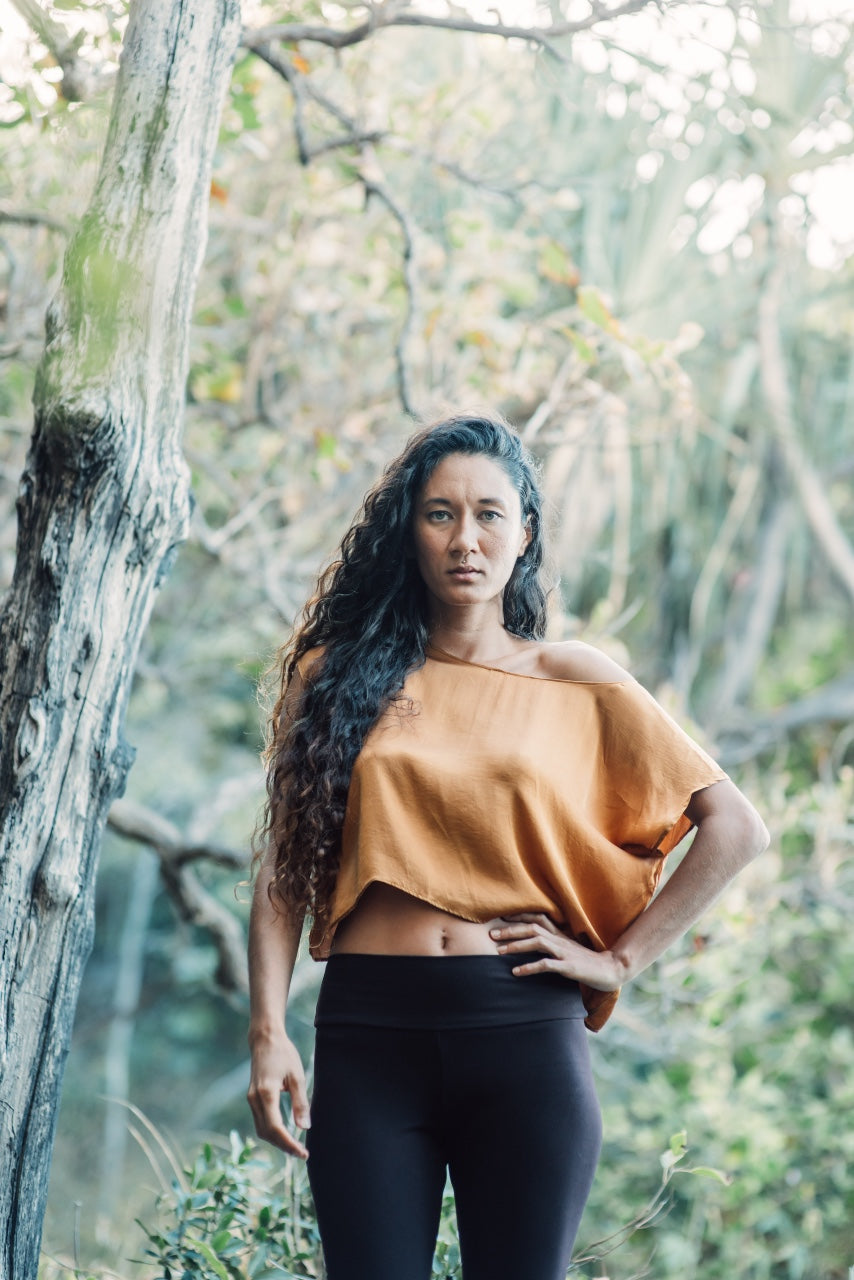 This Gold off shoulder top is crafted from pure silk and was ethically made