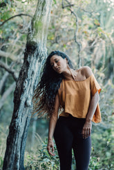 This Gold off shoulder top is crafted from pure silk and was ethically made