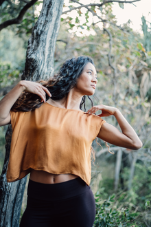  This Gold off shoulder top is crafted from pure silk and was ethically made