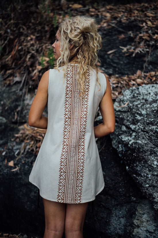 Crafted with earthy, muted tones and adorned with tribal block prints, this vest is crafted from 100% pure cotton, a resilient natural fiber.